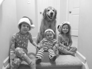 The traditional Christmas morning picture, waiting patiently on the steps to see if Santa came.