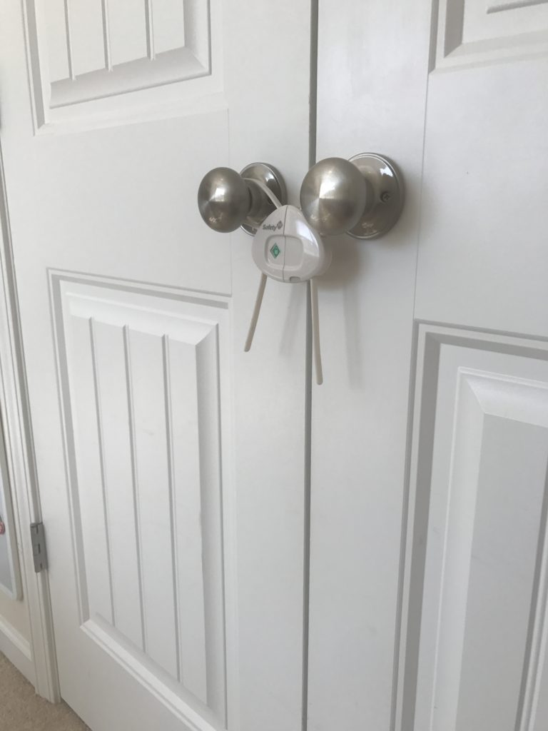 The final piece to the closet office makeover was finding a way to keep little fingers out with a childproof double door lock.