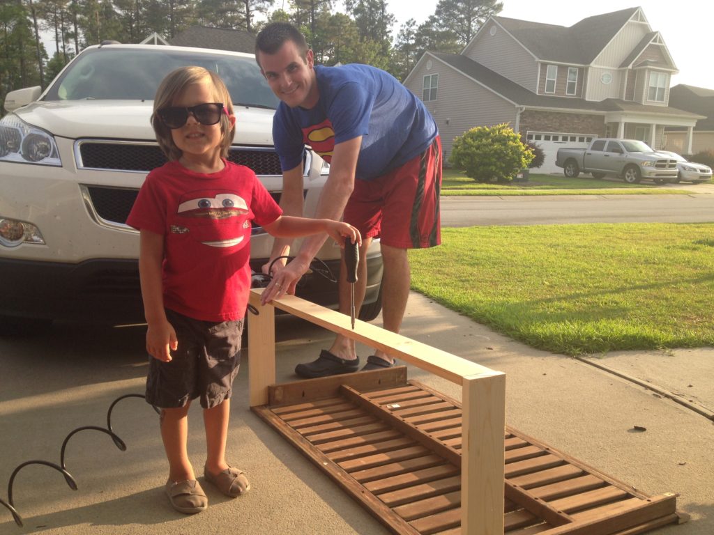 #1 and Daddy building the lemonade stand.
